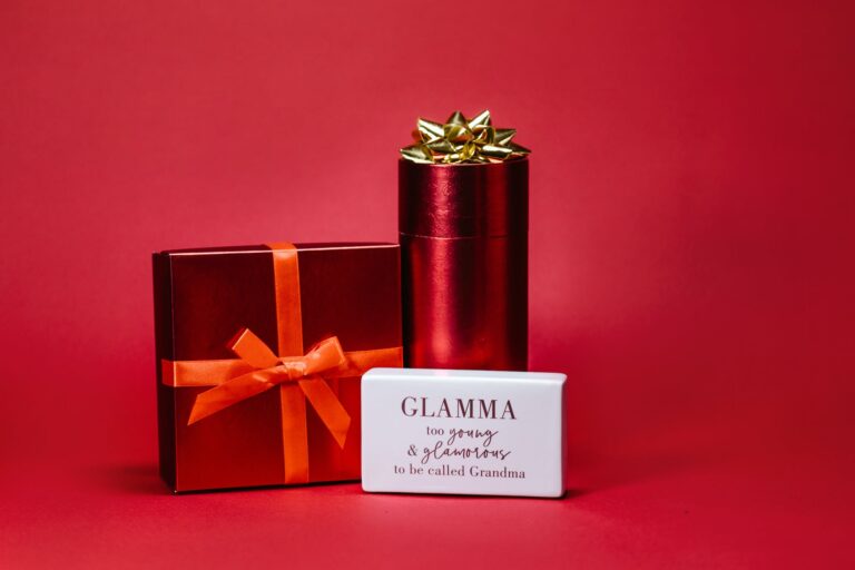 Close-Up Shot of Red Gifts on a Red Surface